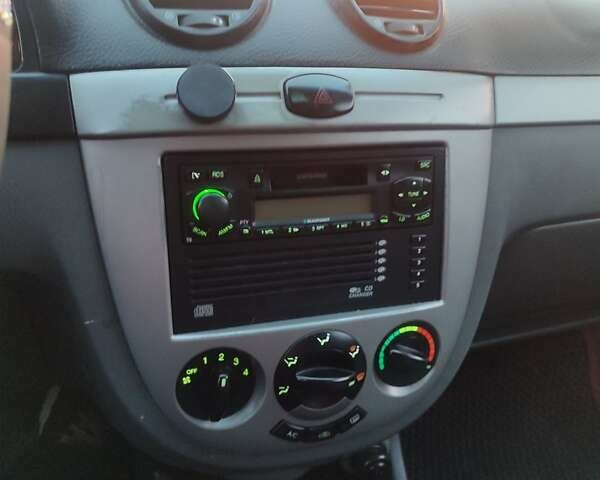 Синий Шевроле Лачетти, объемом двигателя 1.6 л и пробегом 250 тыс. км за 3000 $, фото 5 на Automoto.ua