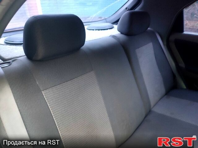 Синий Шевроле Лачетти, объемом двигателя 1.6 л и пробегом 195 тыс. км за 3500 $, фото 8 на Automoto.ua