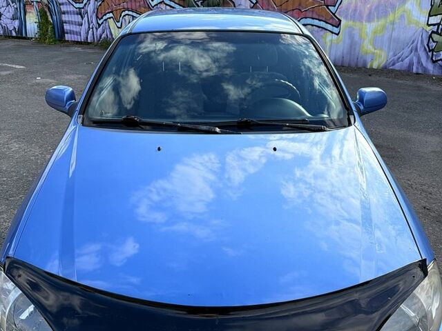 Синий Шевроле Лачетти, объемом двигателя 1.6 л и пробегом 210 тыс. км за 3500 $, фото 2 на Automoto.ua
