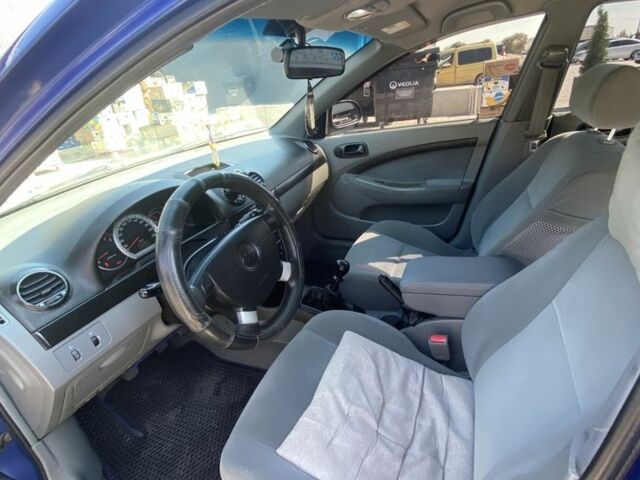 Синий Шевроле Лачетти, объемом двигателя 1.6 л и пробегом 233 тыс. км за 4038 $, фото 18 на Automoto.ua