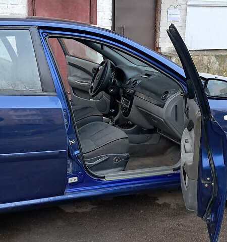 Синий Шевроле Лачетти, объемом двигателя 1.6 л и пробегом 350 тыс. км за 2300 $, фото 12 на Automoto.ua