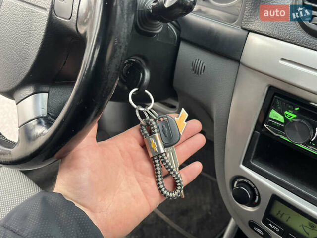 Синий Шевроле Лачетти, объемом двигателя 1.8 л и пробегом 188 тыс. км за 4999 $, фото 35 на Automoto.ua