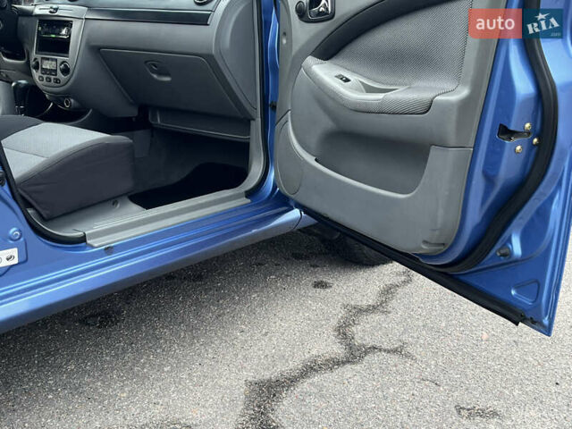 Синий Шевроле Лачетти, объемом двигателя 1.8 л и пробегом 188 тыс. км за 4999 $, фото 26 на Automoto.ua