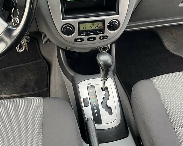 Синий Шевроле Лачетти, объемом двигателя 1.8 л и пробегом 188 тыс. км за 4999 $, фото 34 на Automoto.ua