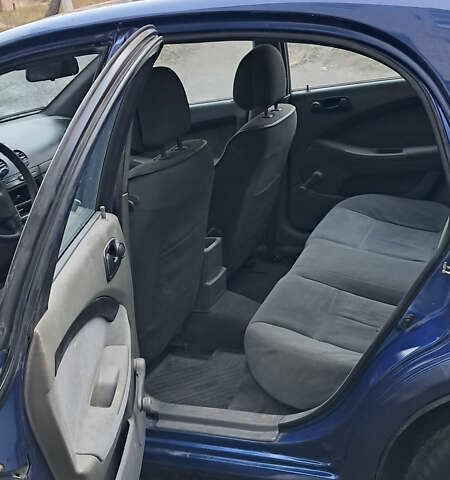 Синий Шевроле Лачетти, объемом двигателя 1.6 л и пробегом 350 тыс. км за 2300 $, фото 13 на Automoto.ua