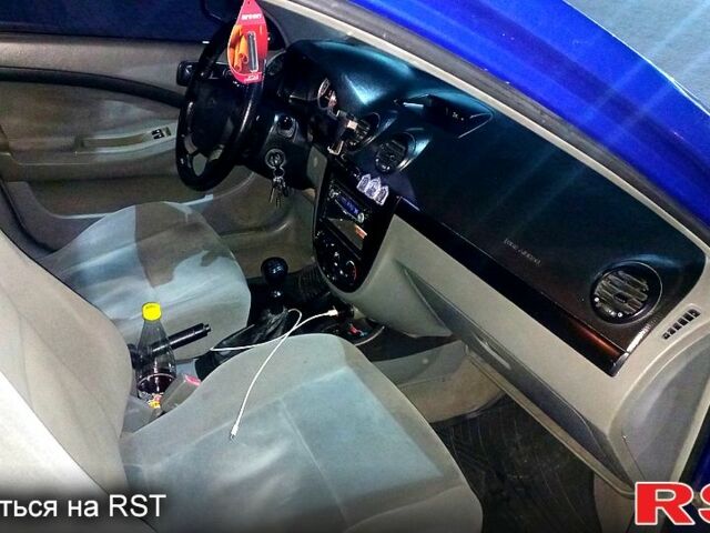 Синий Шевроле Лачетти, объемом двигателя 1.4 л и пробегом 250 тыс. км за 3200 $, фото 3 на Automoto.ua