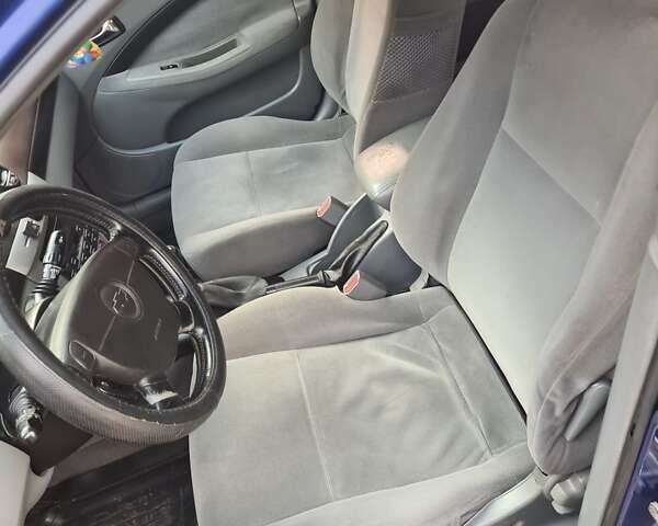 Синий Шевроле Лачетти, объемом двигателя 1.6 л и пробегом 260 тыс. км за 3400 $, фото 12 на Automoto.ua