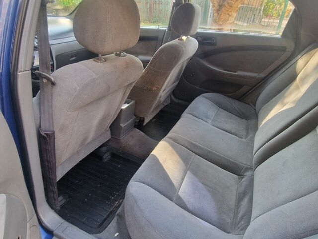 Синій Шевроле Лачетті, об'ємом двигуна 1.6 л та пробігом 208 тис. км за 3600 $, фото 10 на Automoto.ua