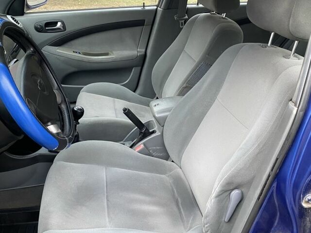 Синий Шевроле Лачетти, объемом двигателя 1.6 л и пробегом 209 тыс. км за 3950 $, фото 4 на Automoto.ua