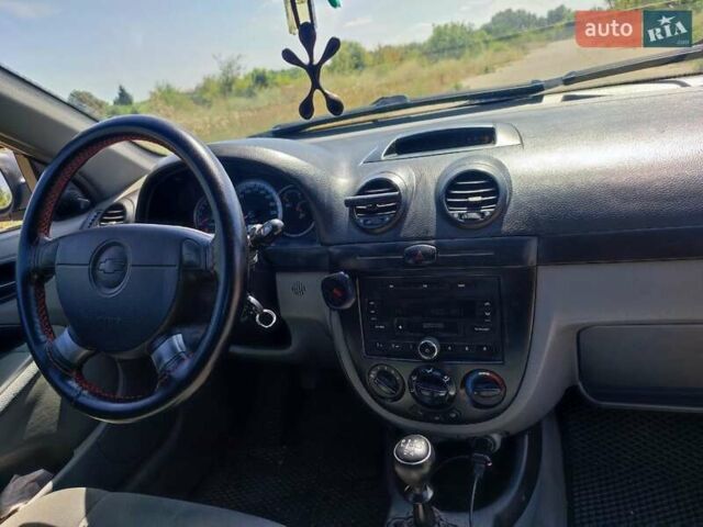 Синий Шевроле Лачетти, объемом двигателя 1.6 л и пробегом 229 тыс. км за 3200 $, фото 5 на Automoto.ua