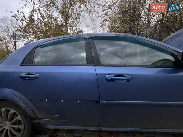 Синий Шевроле Лачетти, объемом двигателя 1.6 л и пробегом 260 тыс. км за 2500 $, фото 2 на Automoto.ua