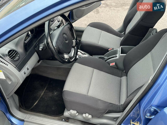 Синий Шевроле Лачетти, объемом двигателя 1.8 л и пробегом 188 тыс. км за 4999 $, фото 30 на Automoto.ua