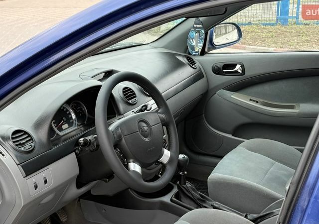 Синій Шевроле Лачетті, об'ємом двигуна 1.6 л та пробігом 224 тис. км за 3999 $, фото 8 на Automoto.ua