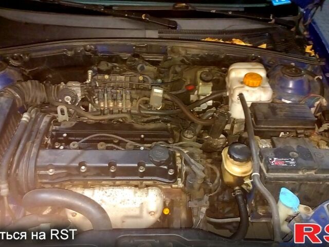 Синий Шевроле Лачетти, объемом двигателя 1.4 л и пробегом 250 тыс. км за 3200 $, фото 1 на Automoto.ua