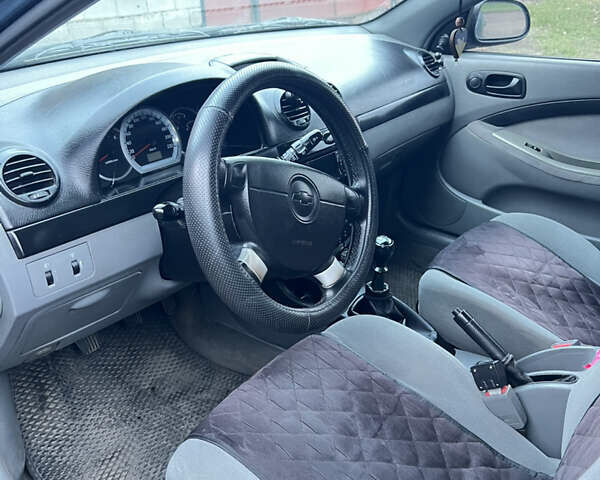 Синий Шевроле Лачетти, объемом двигателя 1.6 л и пробегом 217 тыс. км за 4700 $, фото 4 на Automoto.ua