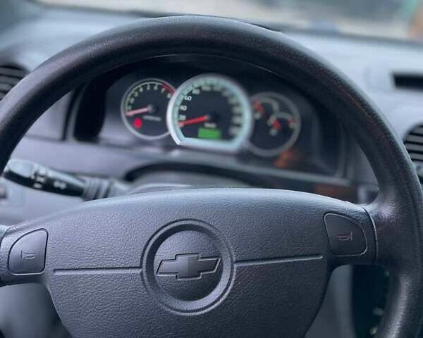 Синий Шевроле Лачетти, объемом двигателя 1.6 л и пробегом 86 тыс. км за 5300 $, фото 19 на Automoto.ua