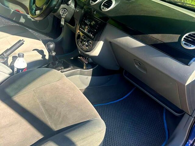 Синий Шевроле Лачетти, объемом двигателя 1.6 л и пробегом 250 тыс. км за 3000 $, фото 3 на Automoto.ua