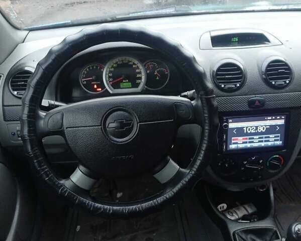 Синий Шевроле Лачетти, объемом двигателя 1.8 л и пробегом 144 тыс. км за 2499 $, фото 11 на Automoto.ua