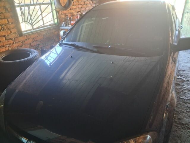 Синий Шевроле Лачетти, объемом двигателя 1.4 л и пробегом 244 тыс. км за 5550 $, фото 5 на Automoto.ua