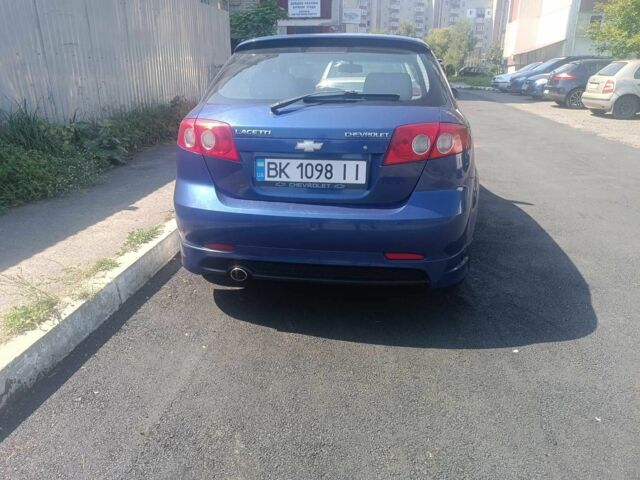 Синий Шевроле Лачетти, объемом двигателя 1.6 л и пробегом 245 тыс. км за 3200 $, фото 2 на Automoto.ua