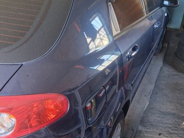 Синий Шевроле Лачетти, объемом двигателя 1.4 л и пробегом 244 тыс. км за 5550 $, фото 4 на Automoto.ua