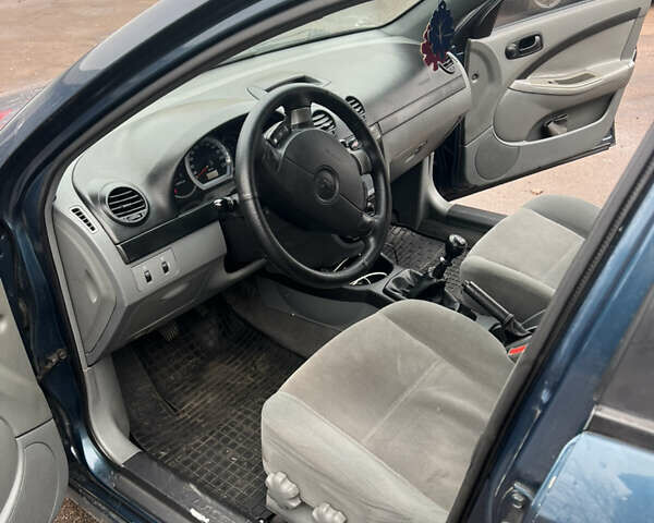 Синий Шевроле Лачетти, объемом двигателя 1.6 л и пробегом 230 тыс. км за 3499 $, фото 4 на Automoto.ua