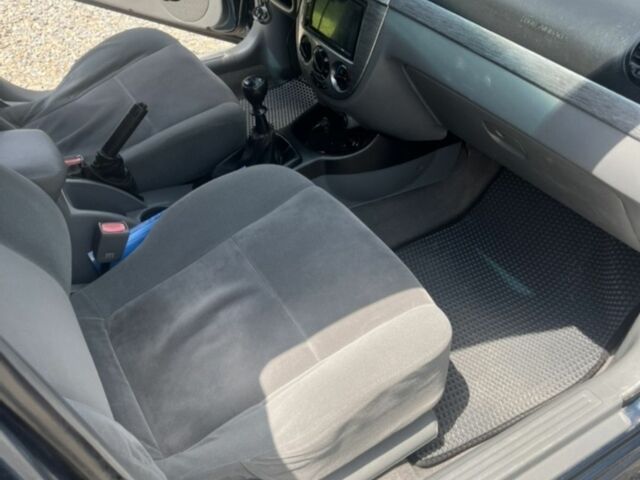 Синий Шевроле Лачетти, объемом двигателя 1.6 л и пробегом 181 тыс. км за 4100 $, фото 5 на Automoto.ua