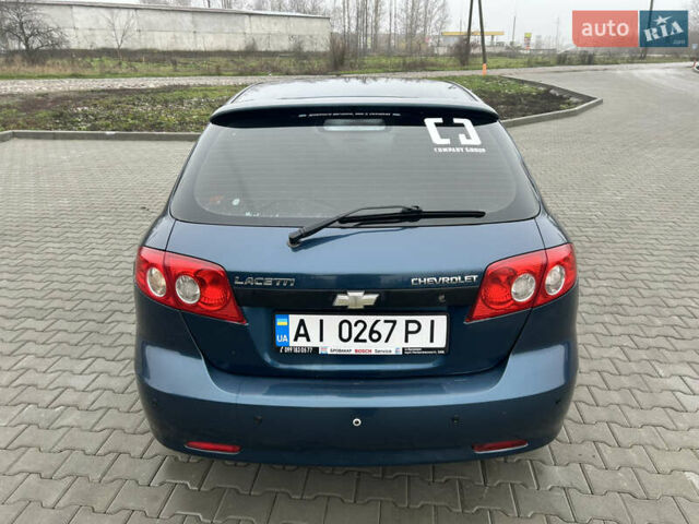 Синий Шевроле Лачетти, объемом двигателя 1.6 л и пробегом 230 тыс. км за 4300 $, фото 6 на Automoto.ua