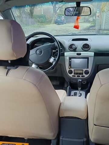 Синий Шевроле Лачетти, объемом двигателя 1.8 л и пробегом 242 тыс. км за 4300 $, фото 3 на Automoto.ua