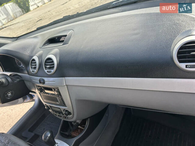 Синій Шевроле Лачетті, об'ємом двигуна 1.8 л та пробігом 106 тис. км за 4200 $, фото 22 на Automoto.ua