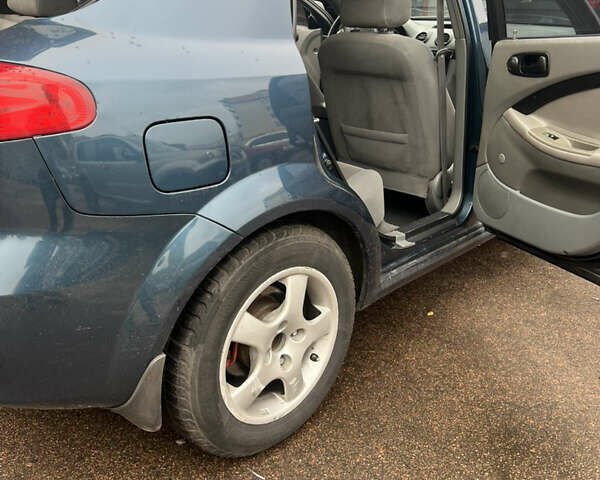 Синий Шевроле Лачетти, объемом двигателя 1.6 л и пробегом 230 тыс. км за 3499 $, фото 6 на Automoto.ua