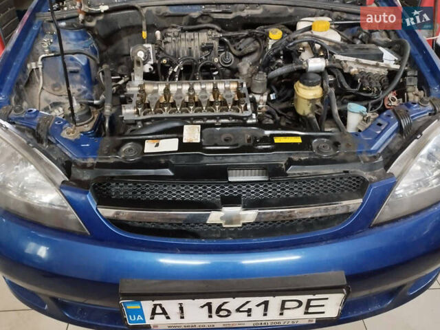 Синій Шевроле Лачетті, об'ємом двигуна 1.6 л та пробігом 267 тис. км за 4999 $, фото 39 на Automoto.ua