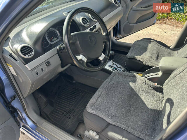 Синій Шевроле Лачетті, об'ємом двигуна 1.8 л та пробігом 106 тис. км за 4200 $, фото 31 на Automoto.ua