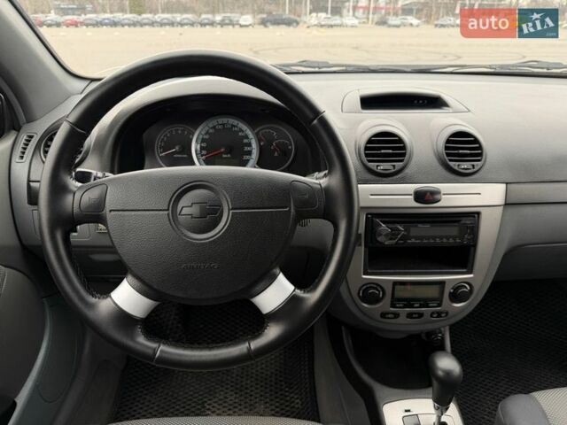 Синий Шевроле Лачетти, объемом двигателя 1.8 л и пробегом 85 тыс. км за 5500 $, фото 11 на Automoto.ua