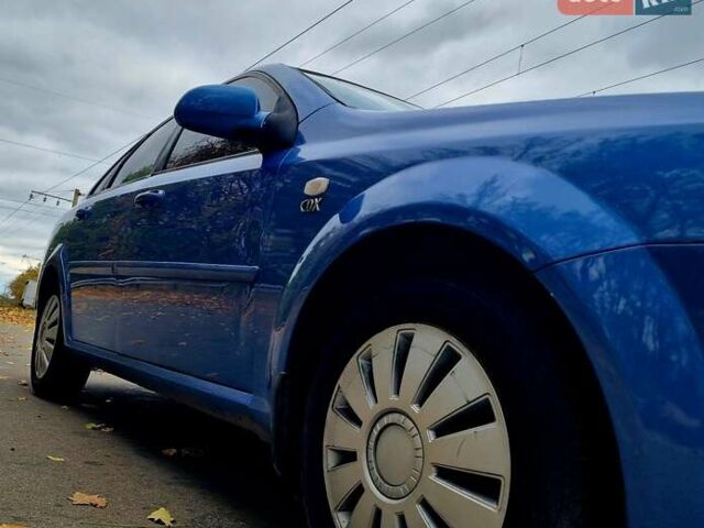 Синій Шевроле Лачетті, об'ємом двигуна 1.8 л та пробігом 280 тис. км за 4500 $, фото 38 на Automoto.ua