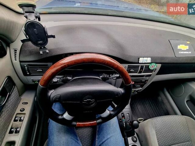 Синій Шевроле Лачетті, об'ємом двигуна 1.8 л та пробігом 280 тис. км за 4500 $, фото 18 на Automoto.ua