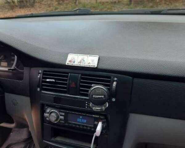 Синий Шевроле Лачетти, объемом двигателя 1.8 л и пробегом 233 тыс. км за 4499 $, фото 6 на Automoto.ua