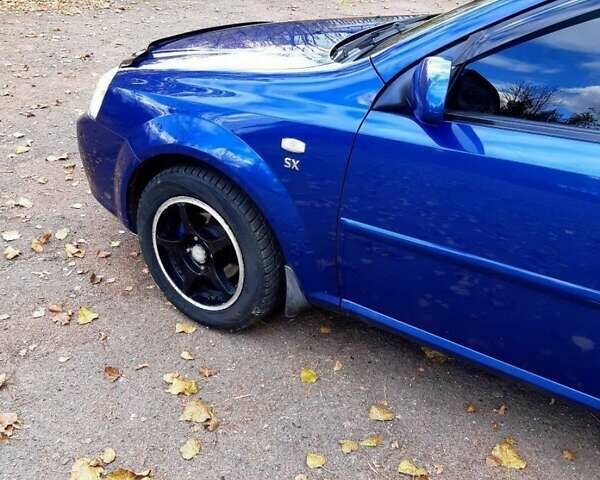 Синий Шевроле Лачетти, объемом двигателя 1.8 л и пробегом 233 тыс. км за 4499 $, фото 4 на Automoto.ua