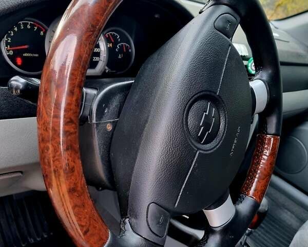 Синій Шевроле Лачетті, об'ємом двигуна 1.8 л та пробігом 280 тис. км за 4500 $, фото 10 на Automoto.ua