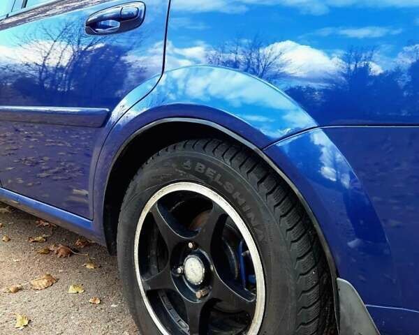 Синий Шевроле Лачетти, объемом двигателя 1.8 л и пробегом 233 тыс. км за 4499 $, фото 2 на Automoto.ua