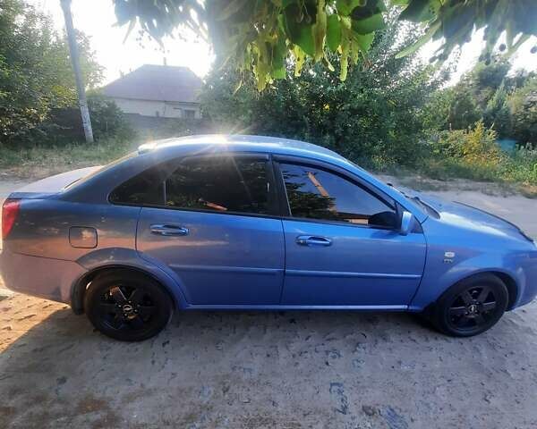 Синий Шевроле Лачетти, объемом двигателя 1.82 л и пробегом 270 тыс. км за 4200 $, фото 1 на Automoto.ua