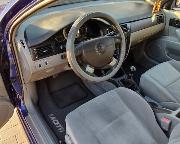 Синий Шевроле Лачетти, объемом двигателя 1.6 л и пробегом 207 тыс. км за 3900 $, фото 12 на Automoto.ua