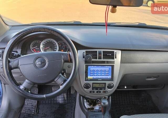 Синий Шевроле Лачетти, объемом двигателя 1.8 л и пробегом 223 тыс. км за 4500 $, фото 5 на Automoto.ua