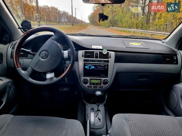 Синій Шевроле Лачетті, об'ємом двигуна 1.8 л та пробігом 280 тис. км за 4500 $, фото 17 на Automoto.ua