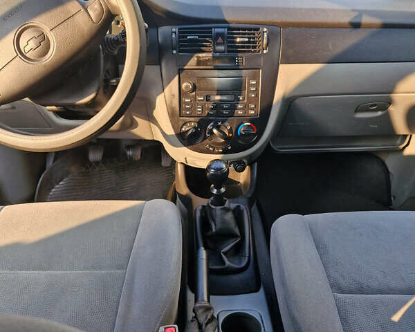 Синий Шевроле Лачетти, объемом двигателя 1.6 л и пробегом 207 тыс. км за 3900 $, фото 15 на Automoto.ua