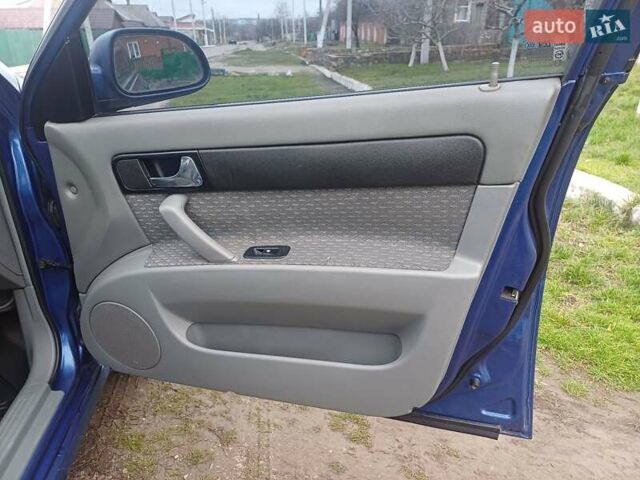 Синій Шевроле Лачетті, об'ємом двигуна 1.8 л та пробігом 186 тис. км за 3950 $, фото 5 на Automoto.ua