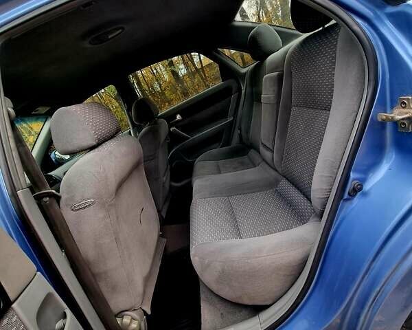 Синій Шевроле Лачетті, об'ємом двигуна 1.8 л та пробігом 280 тис. км за 4500 $, фото 14 на Automoto.ua