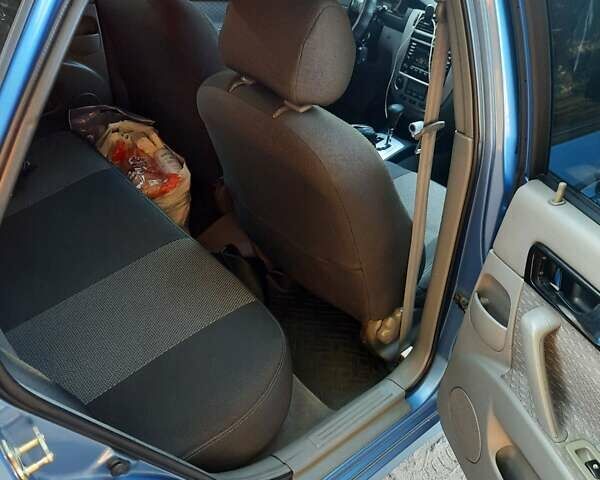 Синий Шевроле Лачетти, объемом двигателя 1.82 л и пробегом 270 тыс. км за 4200 $, фото 5 на Automoto.ua