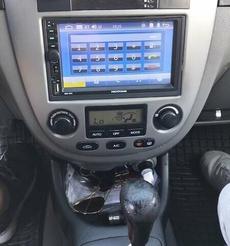 Синий Шевроле Лачетти, объемом двигателя 1.8 л и пробегом 223 тыс. км за 4500 $, фото 2 на Automoto.ua