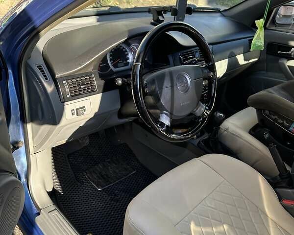 Синий Шевроле Лачетти, объемом двигателя 1.8 л и пробегом 226 тыс. км за 4200 $, фото 6 на Automoto.ua